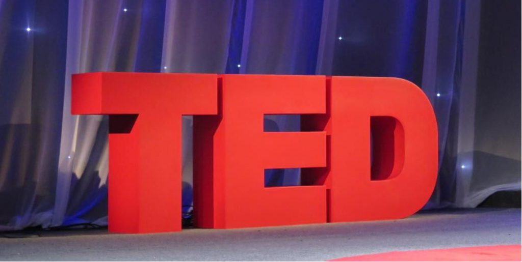 TEDx logo on stage