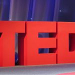 TEDx logo on stage